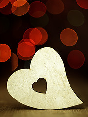 Image showing Heart on a wooden boards background.