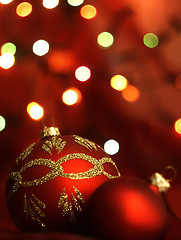 Image showing Red Christmas Tree bauble and magic bokeh.