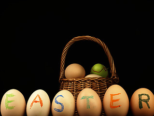 Image showing Easter written on eggs.