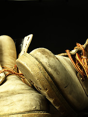 Image showing Pair of old, worn heavy boots.