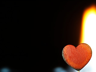 Image showing Flaming heart on a black background.