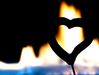 Image showing Flaming heart on a black background.