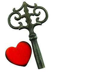 Image showing Old metal key and red heart.