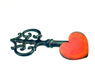 Image showing Old metal key and red heart.