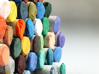 Image showing Colored dry pastel crayons closely.