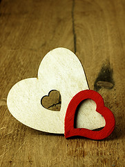 Image showing Heart\'s on a wooden boards background.