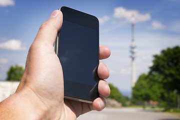 Image showing Mobile phone and broadcasting tower