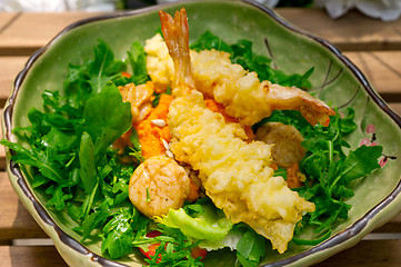 Image showing fresh Japanese tempura shrimps with salad