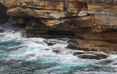 Image showing Ocean flows into sea caves