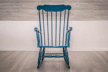 Image showing Rocking chair on wooden floor