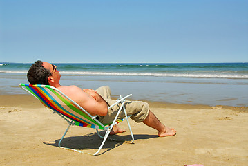 Image showing Man relaxing on beach