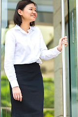 Image showing Young Asian female executive smiling portrait