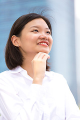 Image showing Young Asian female executive smiling portrait