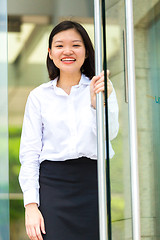 Image showing Young Asian female executive smiling portrait