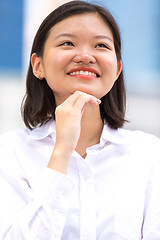 Image showing Young Asian female executive smiling portrait