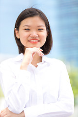 Image showing Young Asian female executive smiling portrait