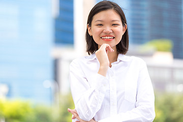 Image showing Young Asian female executive smiling portrait