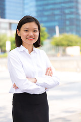 Image showing Young Asian female executive smiling portrait