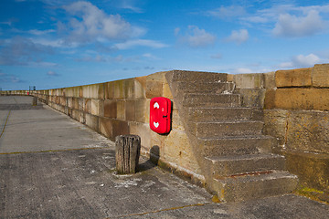 Image showing Empty pier in Scarborough harbor.