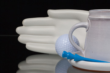 Image showing Ceramics hand and golf equipments 