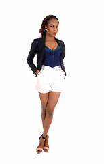 Image showing African woman in white shorts.