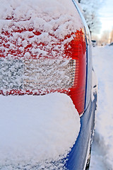 Image showing Car bumper covered by snow