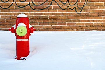 Image showing Red fire hydrant in winter