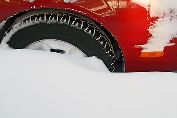 Image showing Car wheel stuck in the deep snow