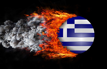 Image showing Flag with a trail of fire and smoke - Greece