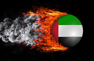 Image showing Flag with a trail of fire and smoke - United Arab Emirates