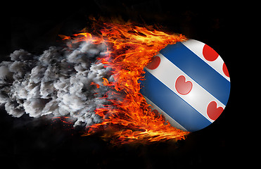 Image showing Flag with a trail of fire and smoke - Friesland