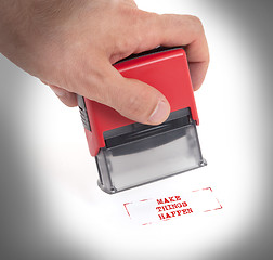 Image showing Plastic stamp in hand, isolated