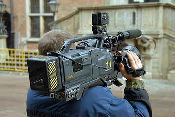 Image showing cameraman in action