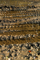 Image showing Dirty broken rural road 