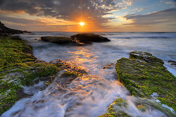 Image showing Ocean flows around the rocks at Bungan Beach