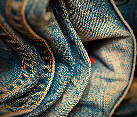 Image showing stitching on blue jeans