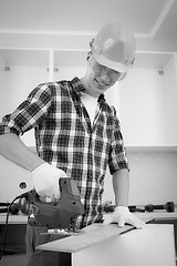 Image showing worker with jigsaw