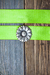 Image showing vintage button flower and two green tapes