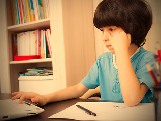 Image showing schoolboy doing homework