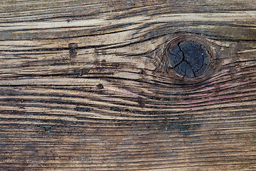 Image showing aged wooden boards with a knot