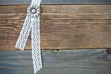 Image showing vintage metal buttons flowers and lace tape