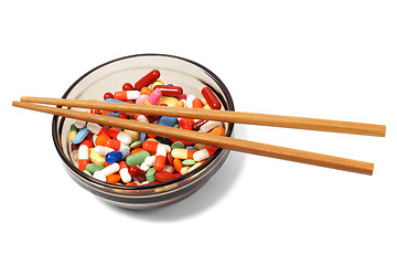 Image showing Bowl with drugs and chopsticks