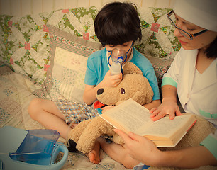 Image showing doctor makes the child inhalation