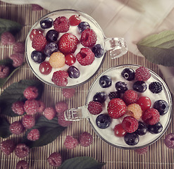 Image showing Two Cups Of Yogurt With Berries