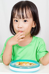 Image showing Little Asain Chinese Eating Pizza