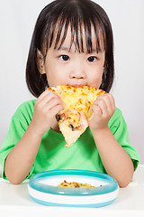 Image showing Little Asain Chinese Eating Pizza