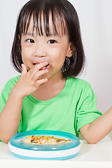 Image showing Little Asain Chinese Eating Pizza