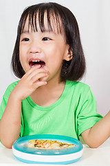 Image showing Little Asain Chinese Eating Pizza
