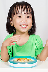 Image showing Little Asain Chinese Eating Pizza