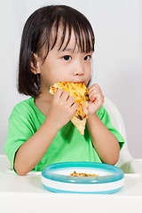 Image showing Little Asain Chinese Eating Pizza